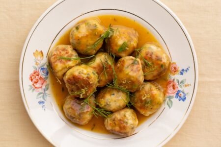 Chicken meatballs with citrus sauce and herbs | The comedist | Gastronomy
 | EUROtoday