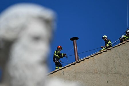 Vatican firefighters set up the Sistine Chapel’s chimney in preparation for papal conclave
 | EUROtoday